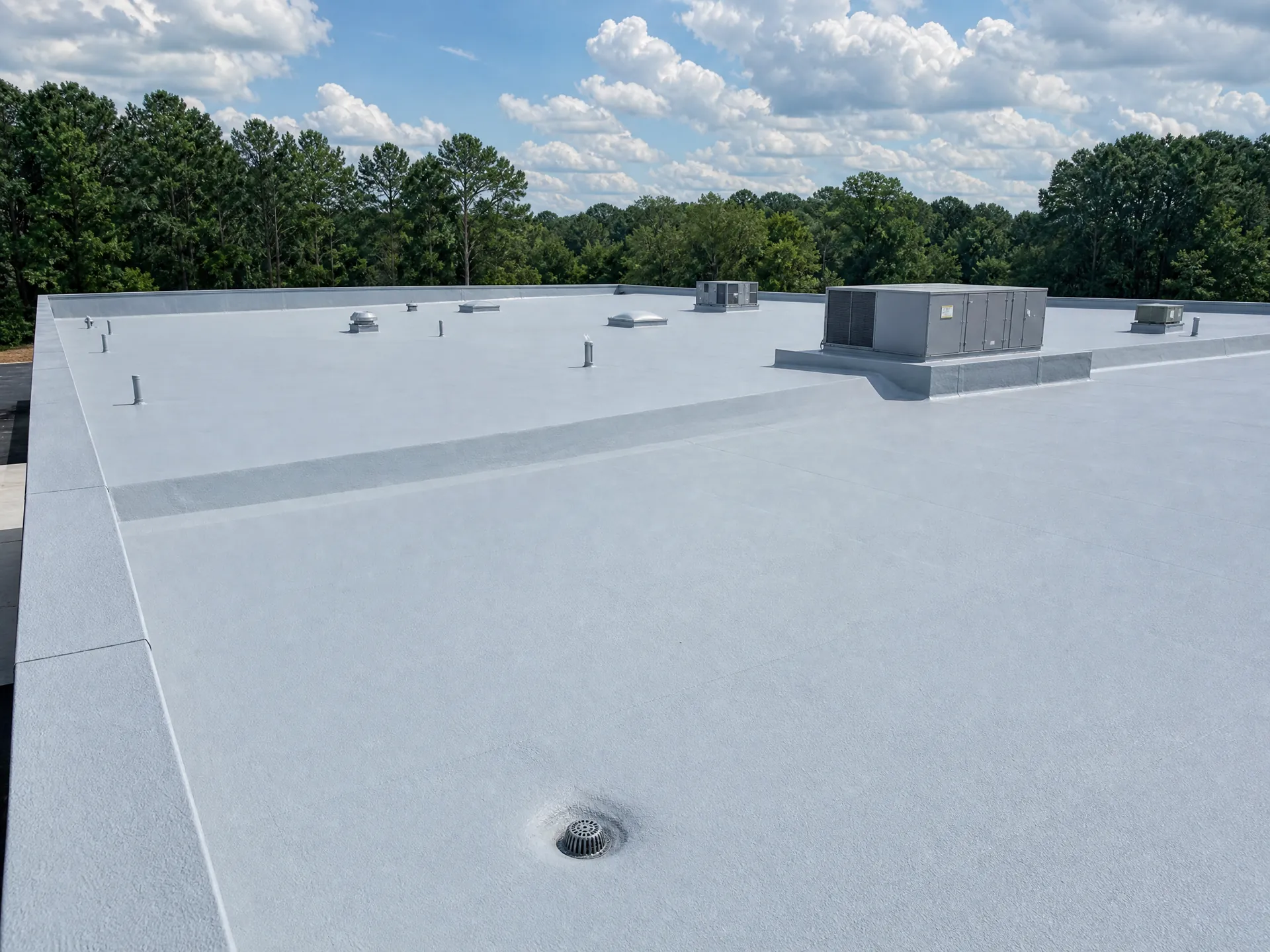Coated spray polyurethane foam roof system on a North Carolina commercial property