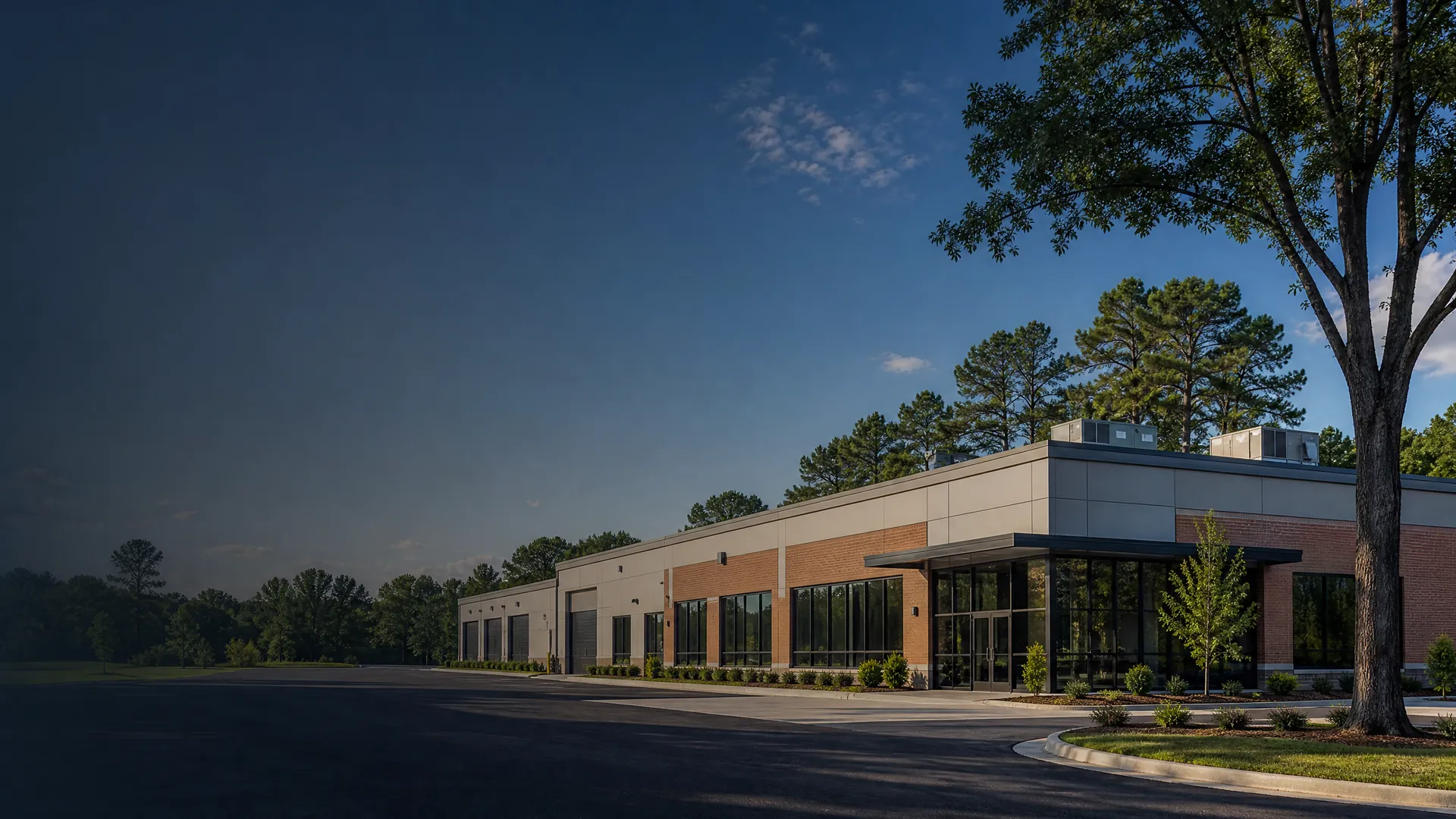 North Carolina commercial office building with a low-slope roof and rooftop HVAC equipment